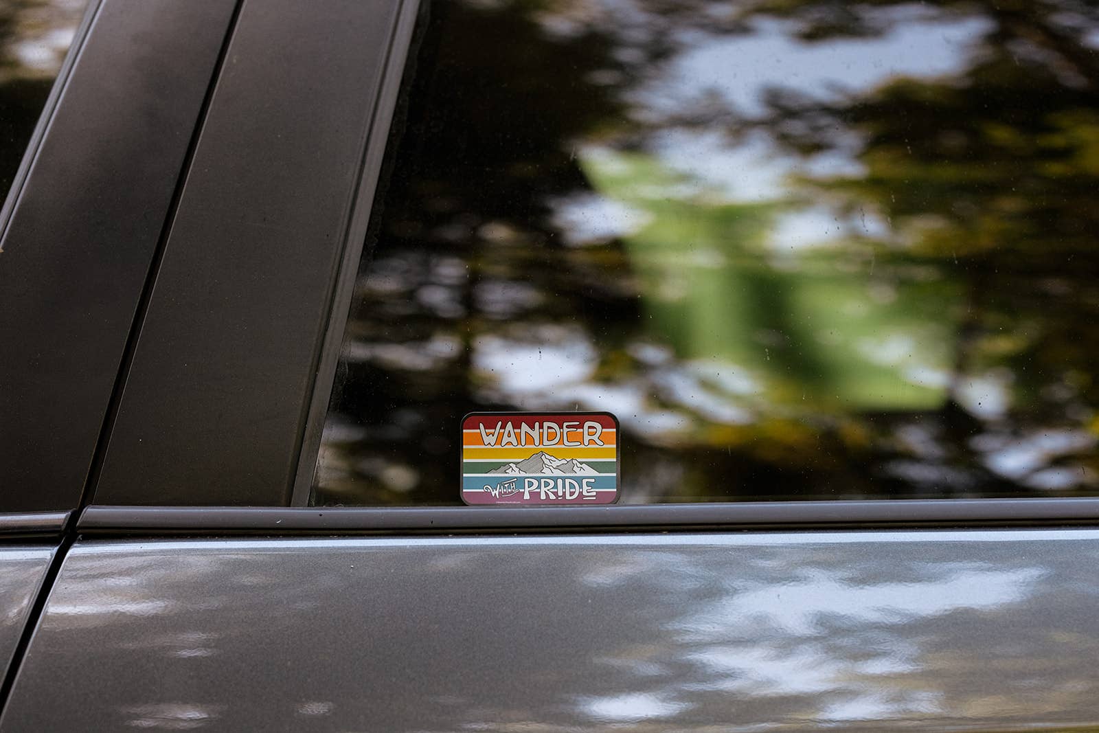 Wander With Pride Sticker