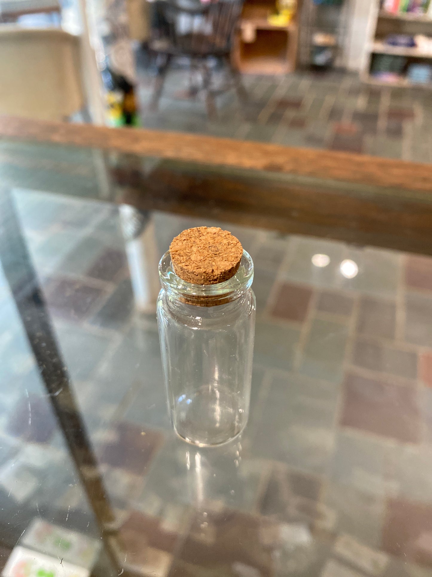 Small glass bottle with cork